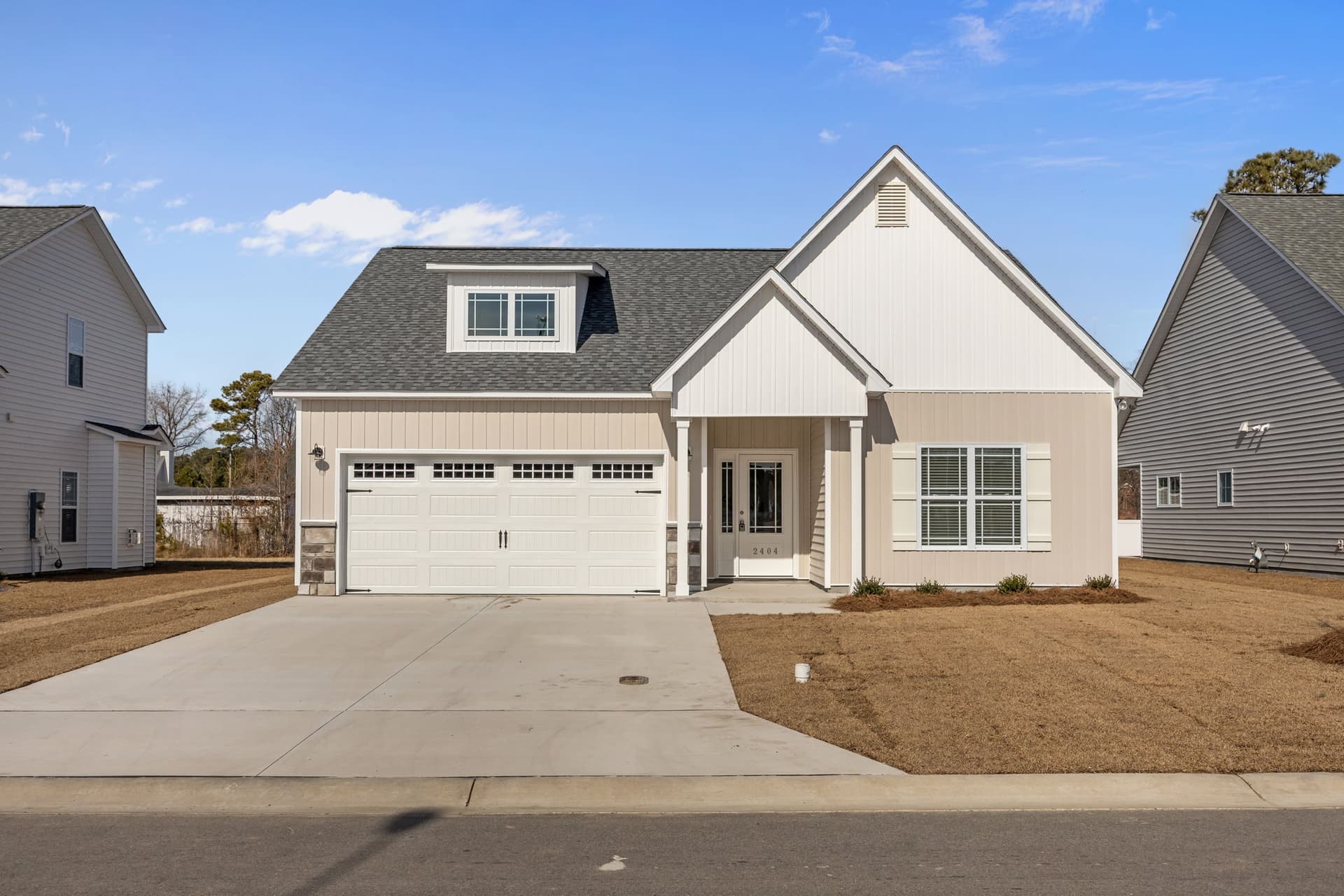 For sale sign in front of well-staged home in Greenville NC